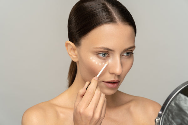 How do I apply concealer correctly?